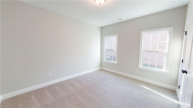 3043 Loch Dr, Winston-Salem, NC 27106 - empty room featuring light carpet and baseboards