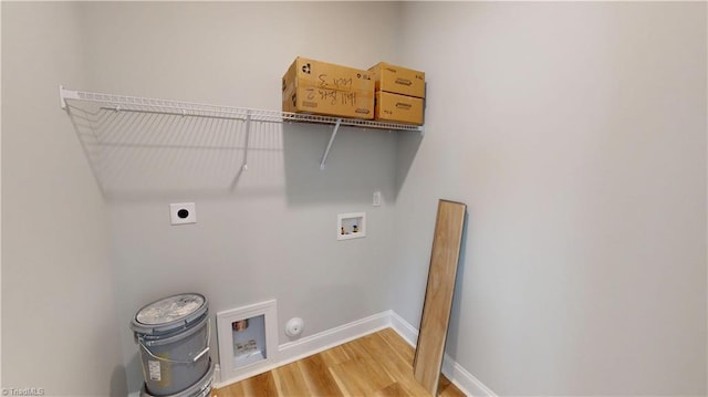 3043 Loch Dr, Winston-Salem, NC 27106 - laundry area with hookup for an electric dryer, hookup for a washing machine, light wood-type flooring, gas dryer hookup, and baseboards
