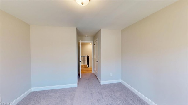 3043 Loch Dr, Winston-Salem, NC 27106 - spare room featuring carpet floors and baseboards