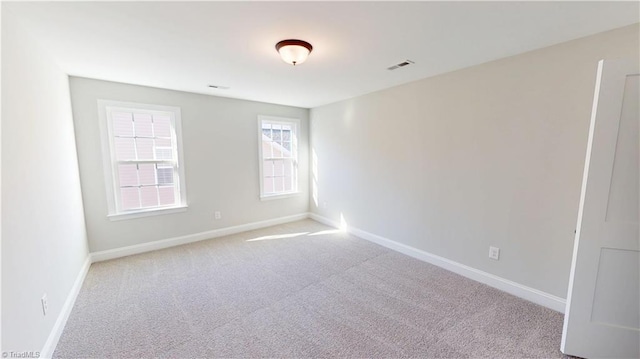 3043 Loch Dr, Winston-Salem, NC 27106 - carpeted spare room with baseboards