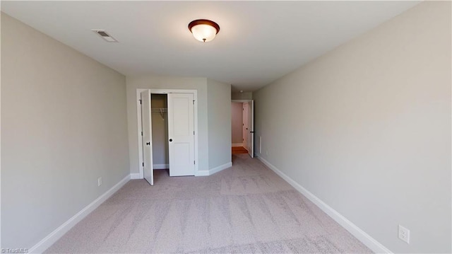 3043 Loch Dr, Winston-Salem, NC 27106 - unfurnished bedroom with carpet, baseboards, and a closet