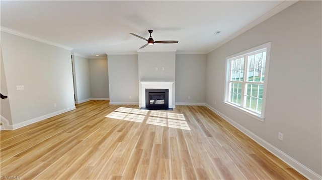 3043 Loch Dr, Winston-Salem, NC 27106 - unfurnished living room featuring ceiling fan, crown molding, baseboards, a fireplace with flush hearth, and light wood finished floors