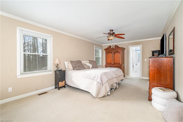 bedroom featuring light colored carpet, baseboards, and ornamental molding