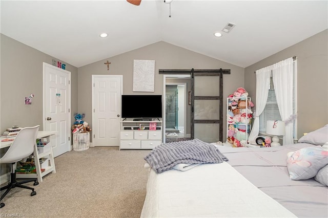 bedroom with visible vents, a ceiling fan, a barn door, carpet flooring, and lofted ceiling