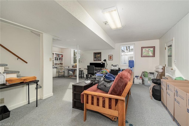 living area with light carpet