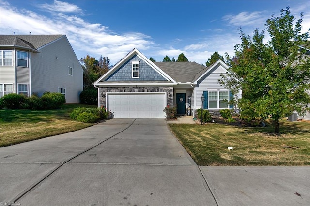 craftsman-style house with a front lawn and a garage