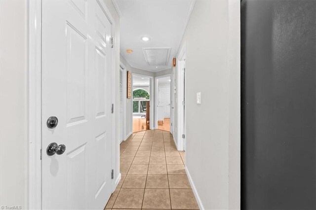 924 Delta Dr, Randleman, NC 27317 - hallway with attic access, light tile patterned floors, crown molding, and recessed lighting