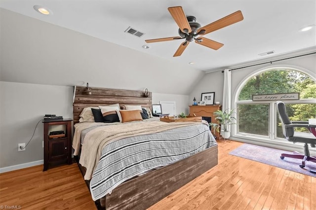 924 Delta Dr, Randleman, NC 27317 - bedroom featuring hardwood / wood-style flooring, lofted ceiling, ceiling fan, and recessed lighting