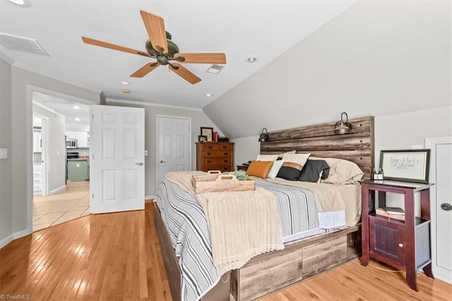 924 Delta Dr, Randleman, NC 27317 - bedroom with light wood-style floors, ceiling fan, crown molding, recessed lighting, and lofted ceiling