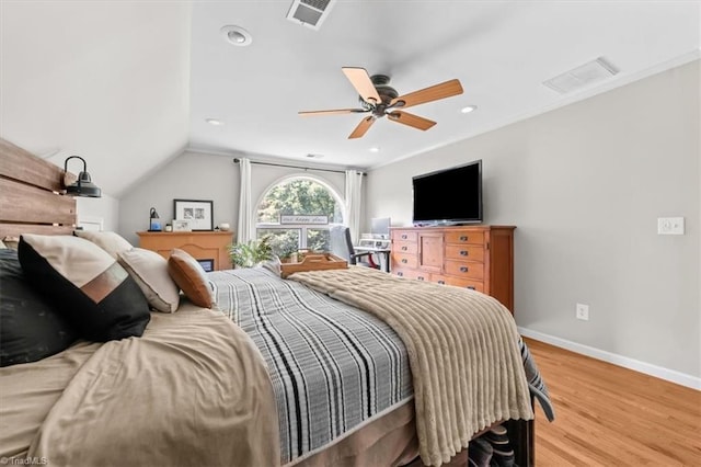 924 Delta Dr, Randleman, NC 27317 - bedroom with light wood finished floors, a ceiling fan, recessed lighting, and vaulted ceiling
