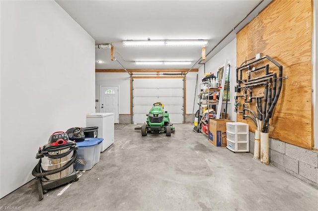 924 Delta Dr, Randleman, NC 27317 - garage featuring refrigerator