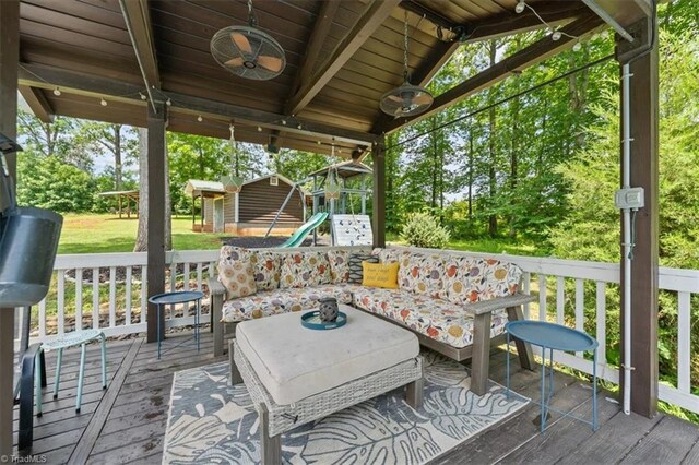 924 Delta Dr, Randleman, NC 27317 - deck with a playground and outdoor lounge area