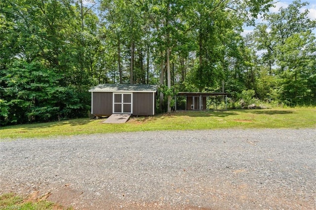 924 Delta Dr, Randleman, NC 27317 - view of front of property with a storage shed and a front yard