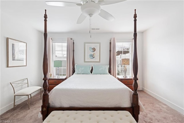 bedroom with visible vents, baseboards, carpet, and ceiling fan