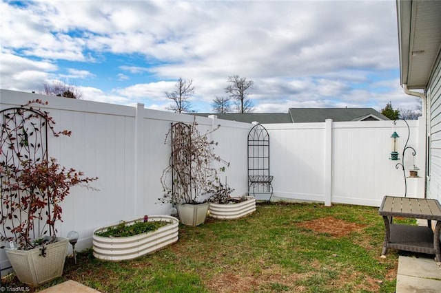 view of yard with fence