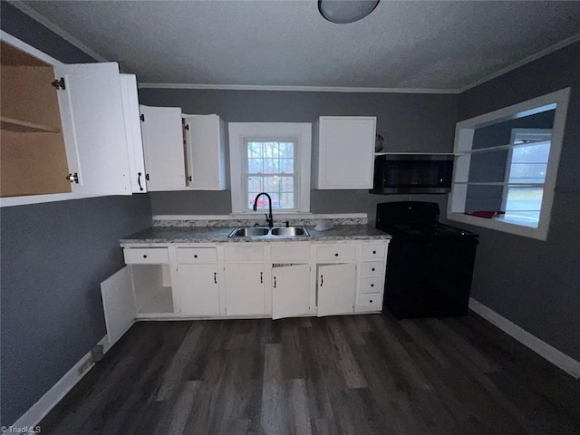 kitchen with a sink, open shelves, electric range, and white cabinetry