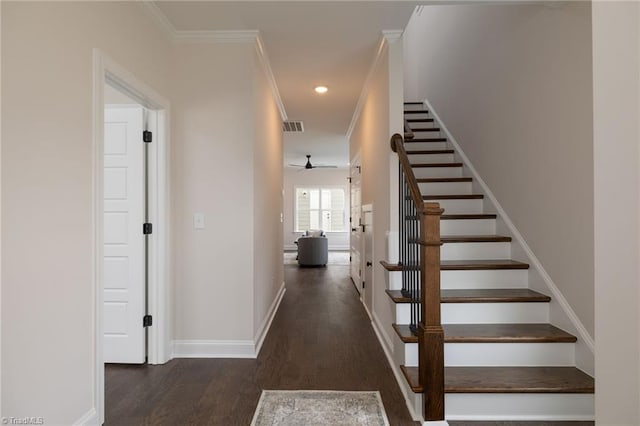 stairway featuring recessed lighting, visible vents, ornamental molding, wood finished floors, and baseboards