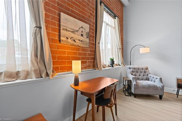 215 S Jefferson Ave Unit 102, West Jefferson, NC 28694 - living area featuring light wood-style flooring and baseboards