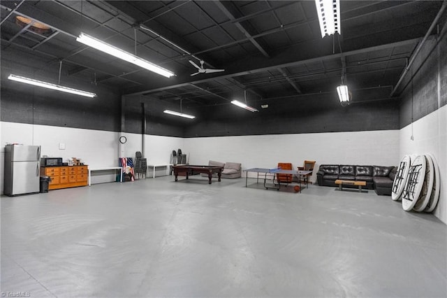 215 S Jefferson Ave Unit 102, West Jefferson, NC 28694 - garage featuring freestanding refrigerator