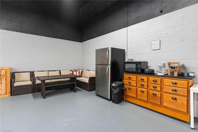 215 S Jefferson Ave Unit 102, West Jefferson, NC 28694 - miscellaneous room featuring finished concrete flooring