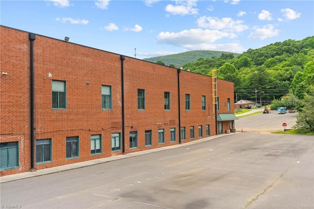 215 S Jefferson Ave Unit 102, West Jefferson, NC 28694 - view of building exterior featuring a mountain view