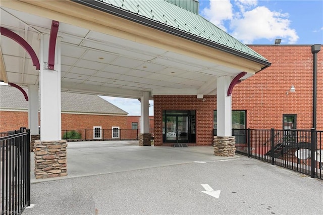 215 S Jefferson Ave Unit 102, West Jefferson, NC 28694 - view of patio / terrace featuring an attached carport