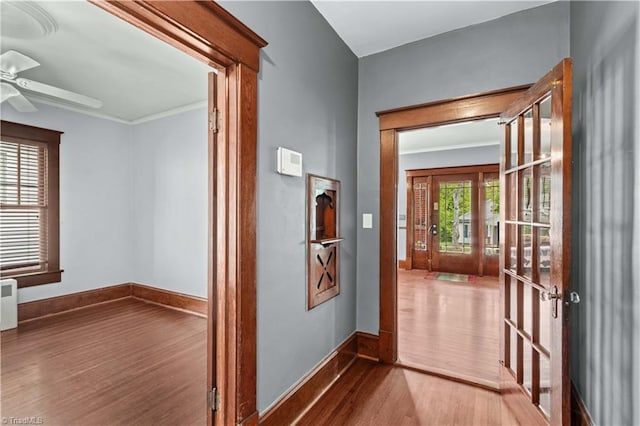 119 Wiley Ave, Salisbury, NC 28144 - hallway featuring wood finished floors, baseboards, and crown molding