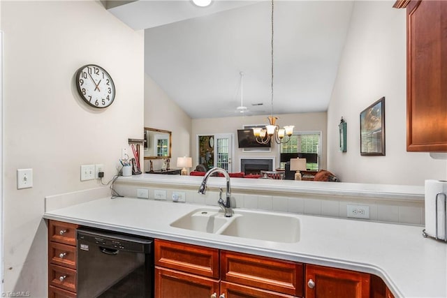1627 Crestlawn Trl, Pfafftown, NC 27040 - kitchen featuring dishwasher, vaulted ceiling, light countertops, a sink, and open floor plan