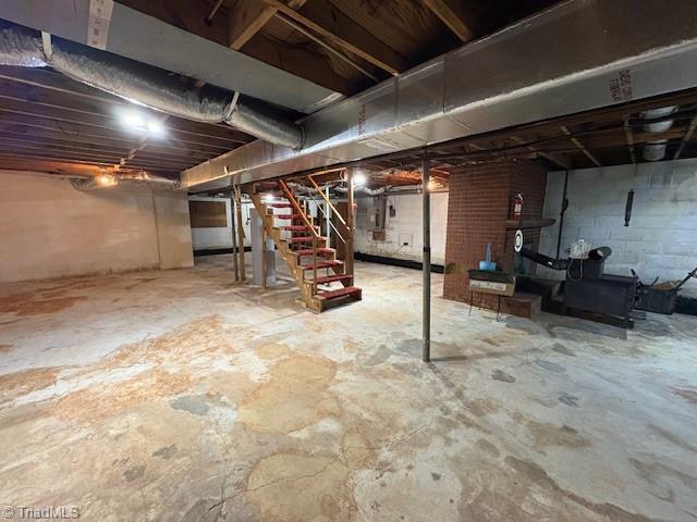unfinished basement with stairway