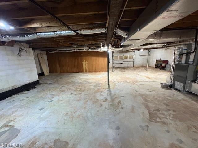 unfinished basement with heating unit