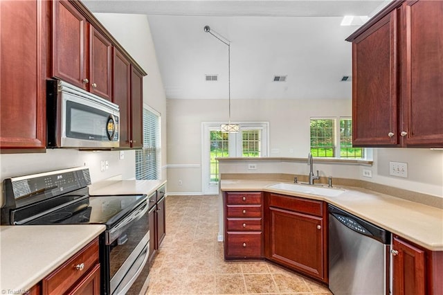 4012 Chianti Way, Greensboro, NC 27410 - kitchen with appliances with stainless steel finishes, a sink, dark brown cabinets, light countertops, and vaulted ceiling