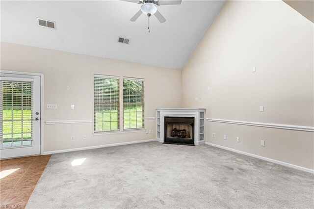 4012 Chianti Way, Greensboro, NC 27410 - unfurnished living room featuring carpet floors, a fireplace, ceiling fan, baseboards, and high vaulted ceiling