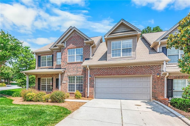 4012 Chianti Way, Greensboro, NC 27410 - view of front of home featuring driveway, brick siding, a garage, and roof with shingles