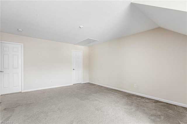4012 Chianti Way, Greensboro, NC 27410 - empty room with attic access, carpet flooring, baseboards, and lofted ceiling