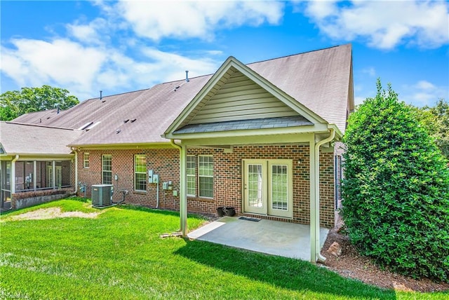 4012 Chianti Way, Greensboro, NC 27410 - rear view of property with central AC, a lawn, brick siding, and a patio