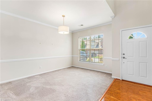 4012 Chianti Way, Greensboro, NC 27410 - foyer entrance featuring baseboards, ornamental molding, and carpet floors