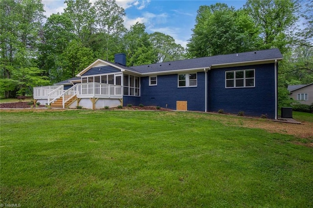 104 Shawnee Cir, Lexington, NC 27295 - rear view of house featuring stairs, a sunroom, a chimney, cooling unit, and a lawn