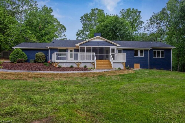 104 Shawnee Cir, Lexington, NC 27295 - single story home featuring stairs, a front lawn, a sunroom, a deck, and a chimney