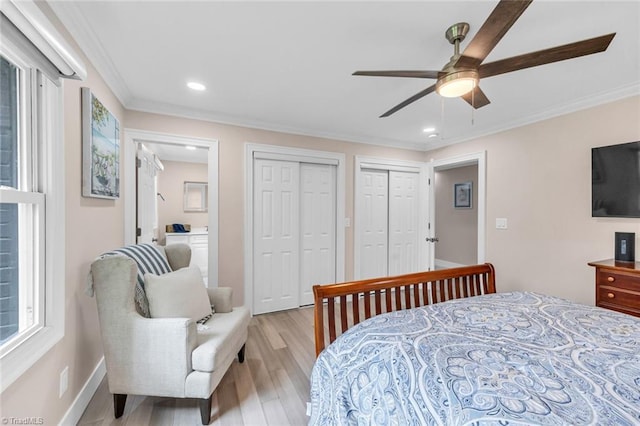 104 Shawnee Cir, Lexington, NC 27295 - bedroom featuring a ceiling fan, light wood finished floors, multiple closets, ornamental molding, and recessed lighting