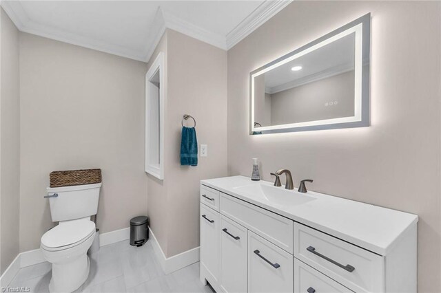 104 Shawnee Cir, Lexington, NC 27295 - bathroom with crown molding, vanity, toilet, marble finish floor, and baseboards
