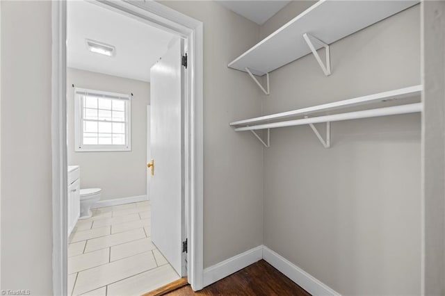 walk in closet with visible vents and tile patterned flooring