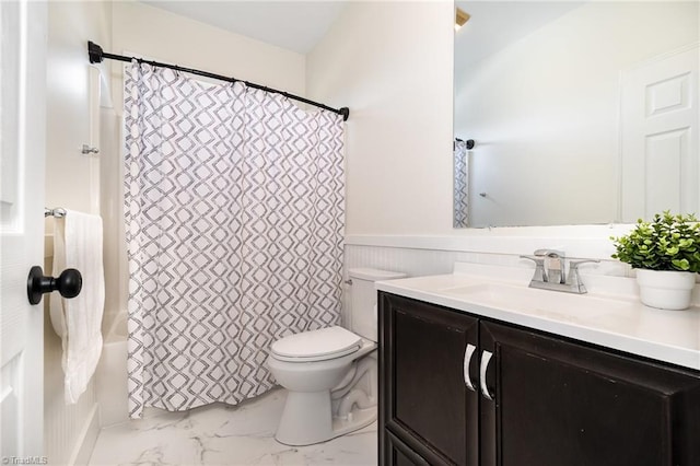 2264 Loflin Farlow Ln, Sophia, NC 27350 - full bath with marble look tiles, vanity, and a wainscoted wall