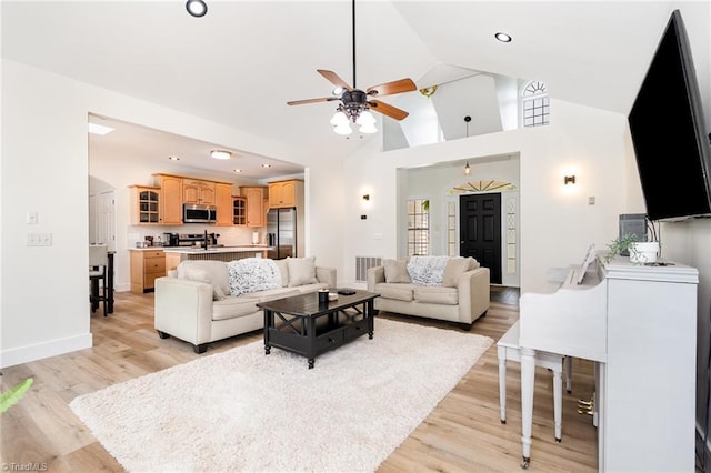 2264 Loflin Farlow Ln, Sophia, NC 27350 - living room featuring a ceiling fan, light wood finished floors, high vaulted ceiling, and recessed lighting