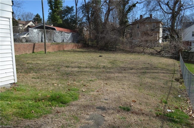 view of yard featuring fence