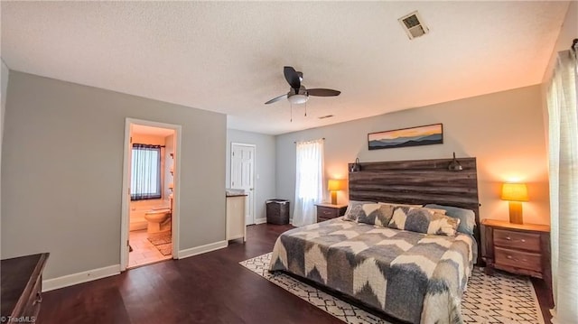 1721 Abbottsford Dr, Kernersville, NC 27284 - bedroom featuring wood finished floors, ensuite bath, a ceiling fan, and a textured ceiling