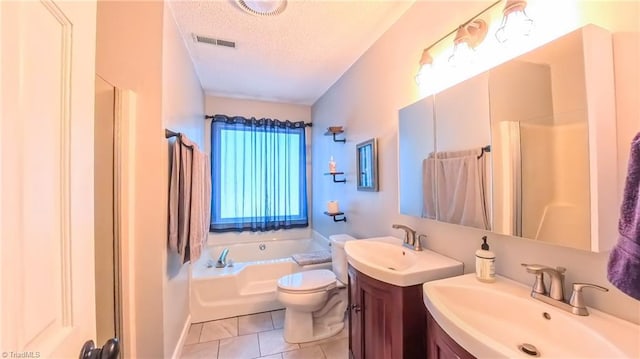 1721 Abbottsford Dr, Kernersville, NC 27284 - full bathroom featuring a textured ceiling, vanity, a garden tub, tile patterned flooring, and a shower