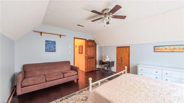 1721 Abbottsford Dr, Kernersville, NC 27284 - bedroom with lofted ceiling, a textured ceiling, dark wood-style floors, and ceiling fan