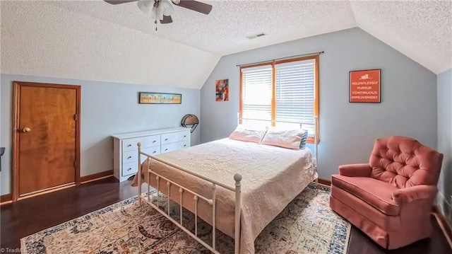 1721 Abbottsford Dr, Kernersville, NC 27284 - bedroom with a textured ceiling, vaulted ceiling, a ceiling fan, and wood finished floors
