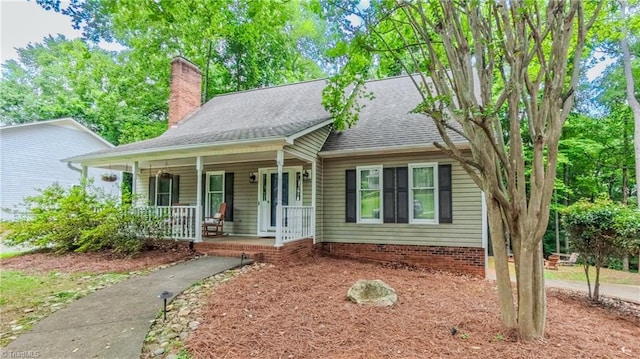 1721 Abbottsford Dr, Kernersville, NC 27284 - single story home featuring a porch, a chimney, and roof with shingles