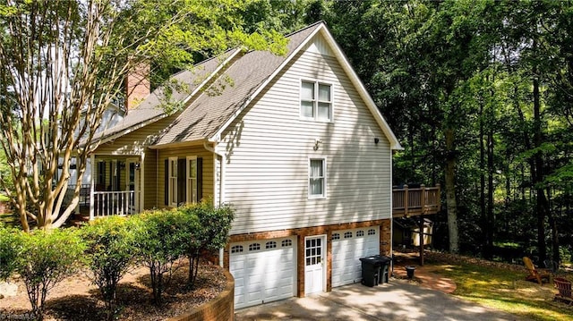 1721 Abbottsford Dr, Kernersville, NC 27284 - view of side of property featuring driveway, an attached garage, a chimney, and a shingled roof